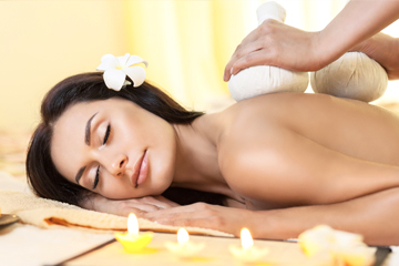 Kräuterstempelmassage
